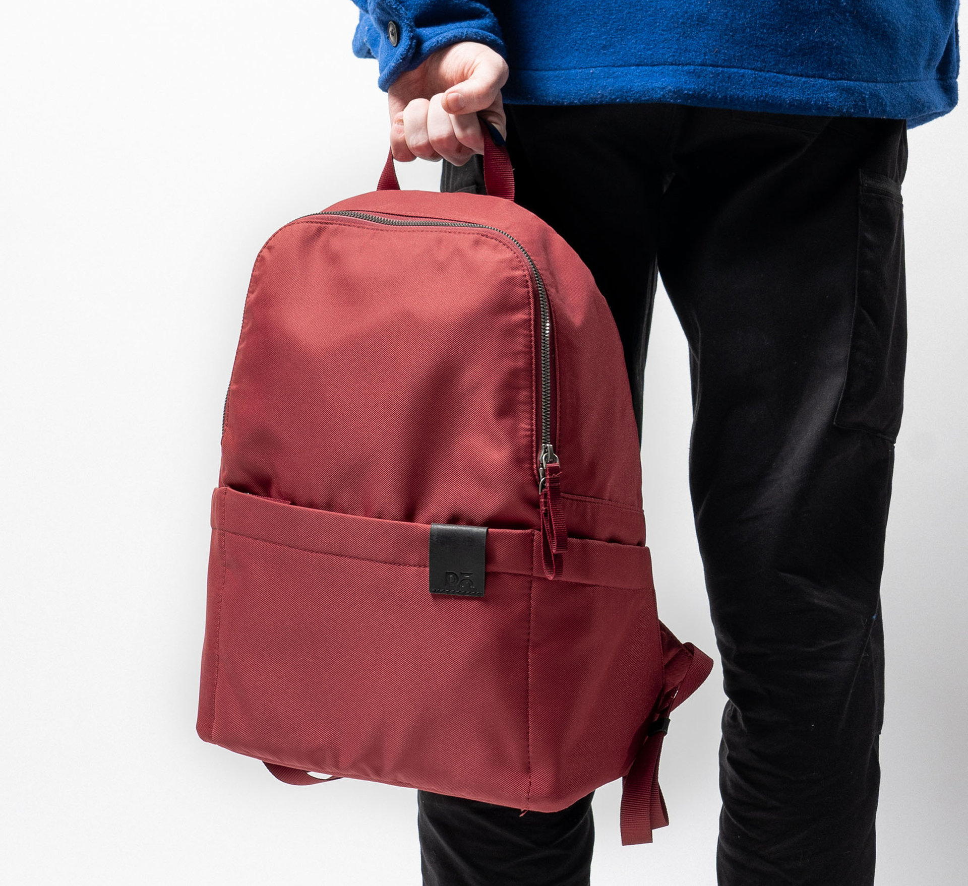 Amber Lunar Daypack with natural textures, paired with festival bracelets and accessories