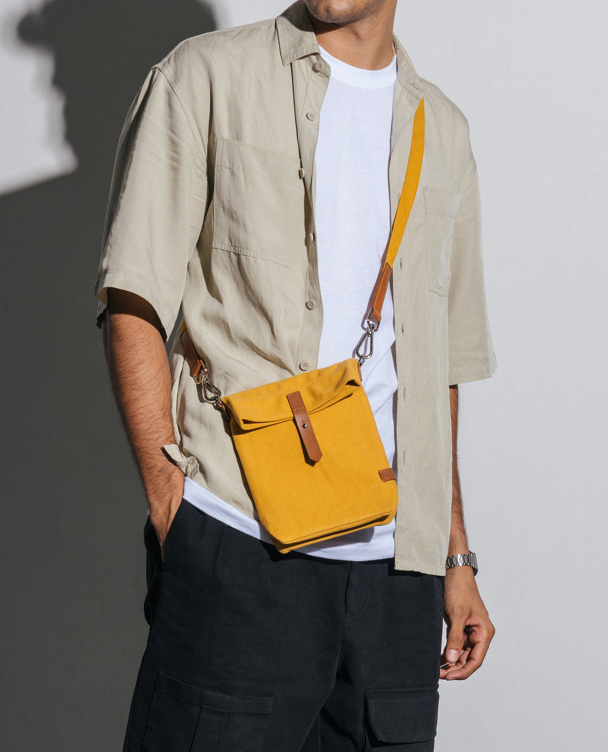 Mustard yellow sling outlet bag