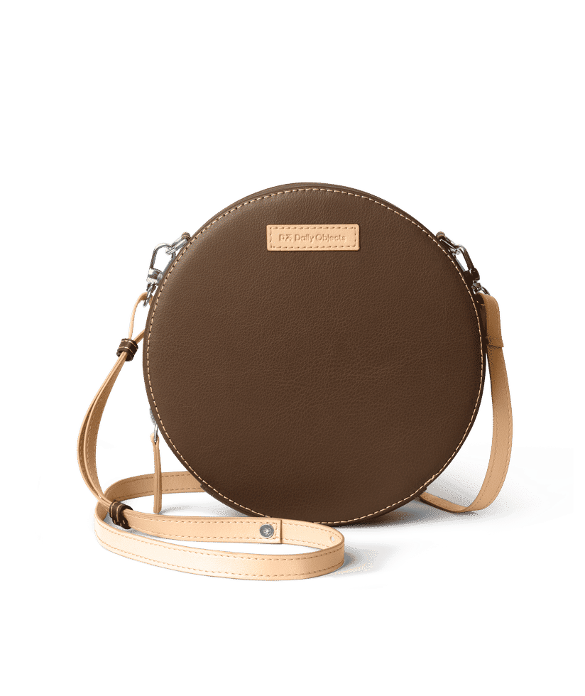 Brown round crossbody bag sales